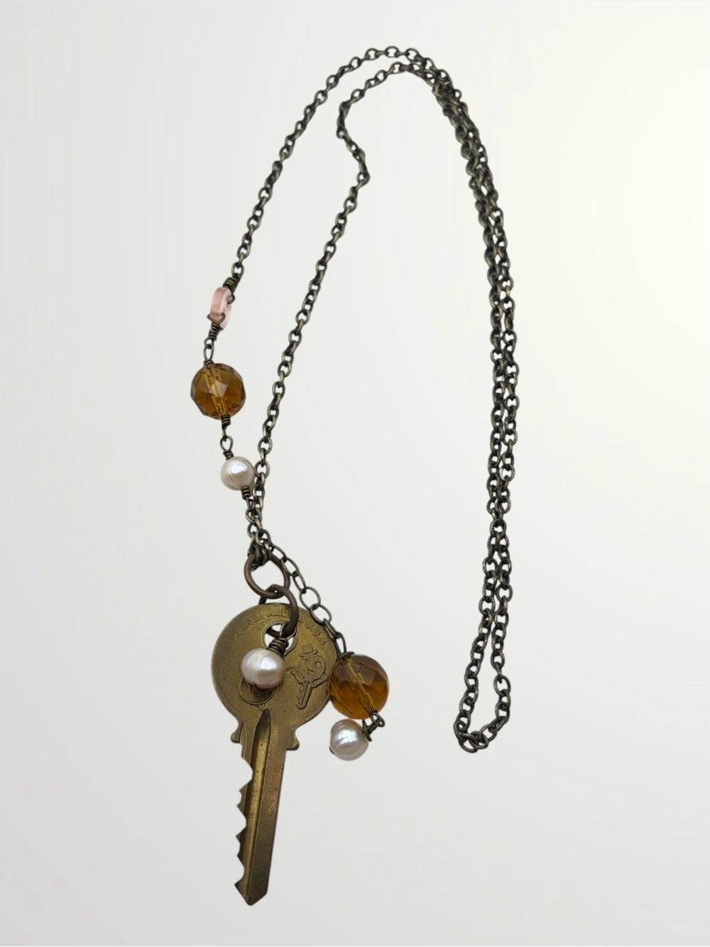 Bronze Key, Crystal, and Pearl Necklace
